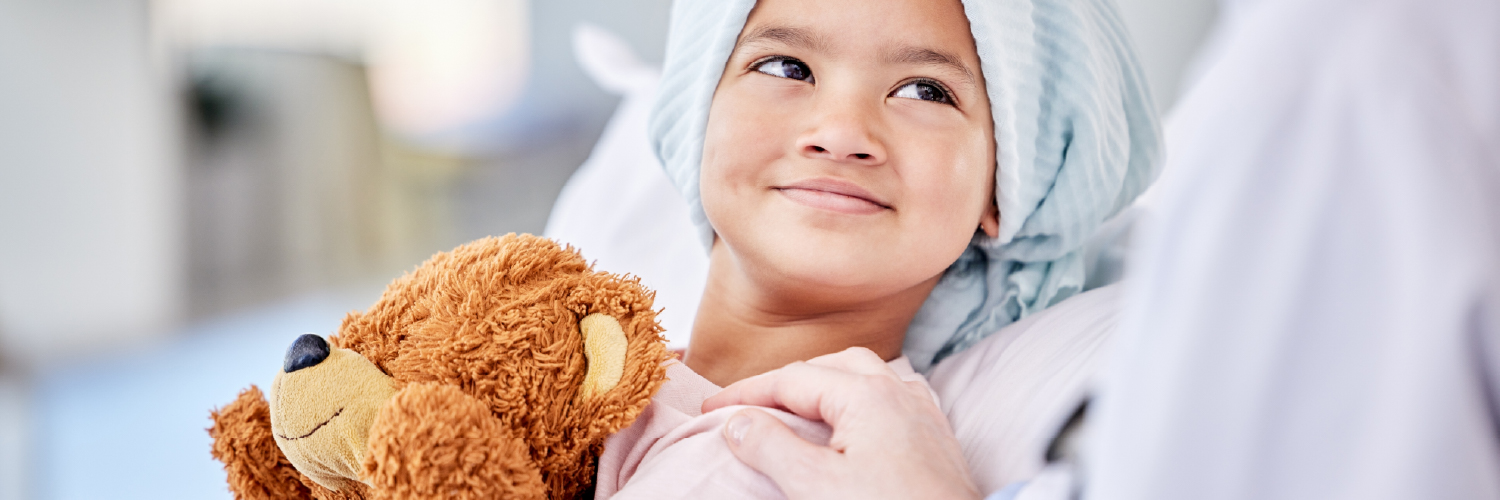 Sometimes all it takes is a soft plushy and a a smile to brighten a child's day.