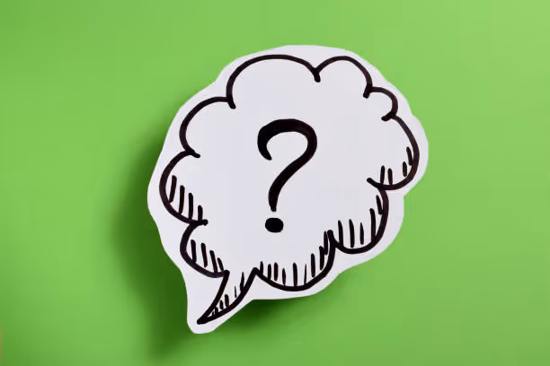 Question bubble on green background.