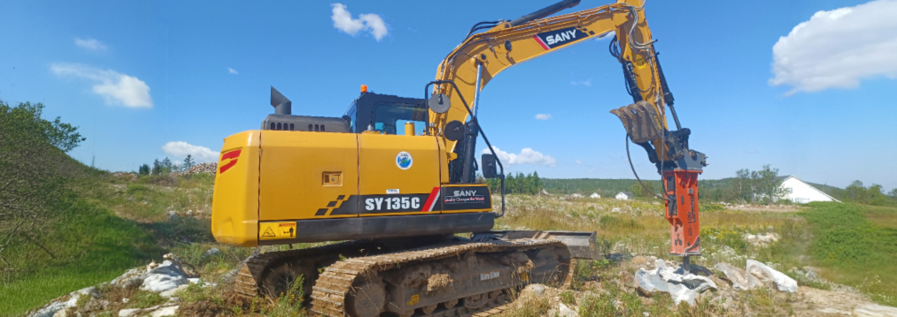 Hydraulic hammer Canada SWT from Heavy Equipment Guide article.