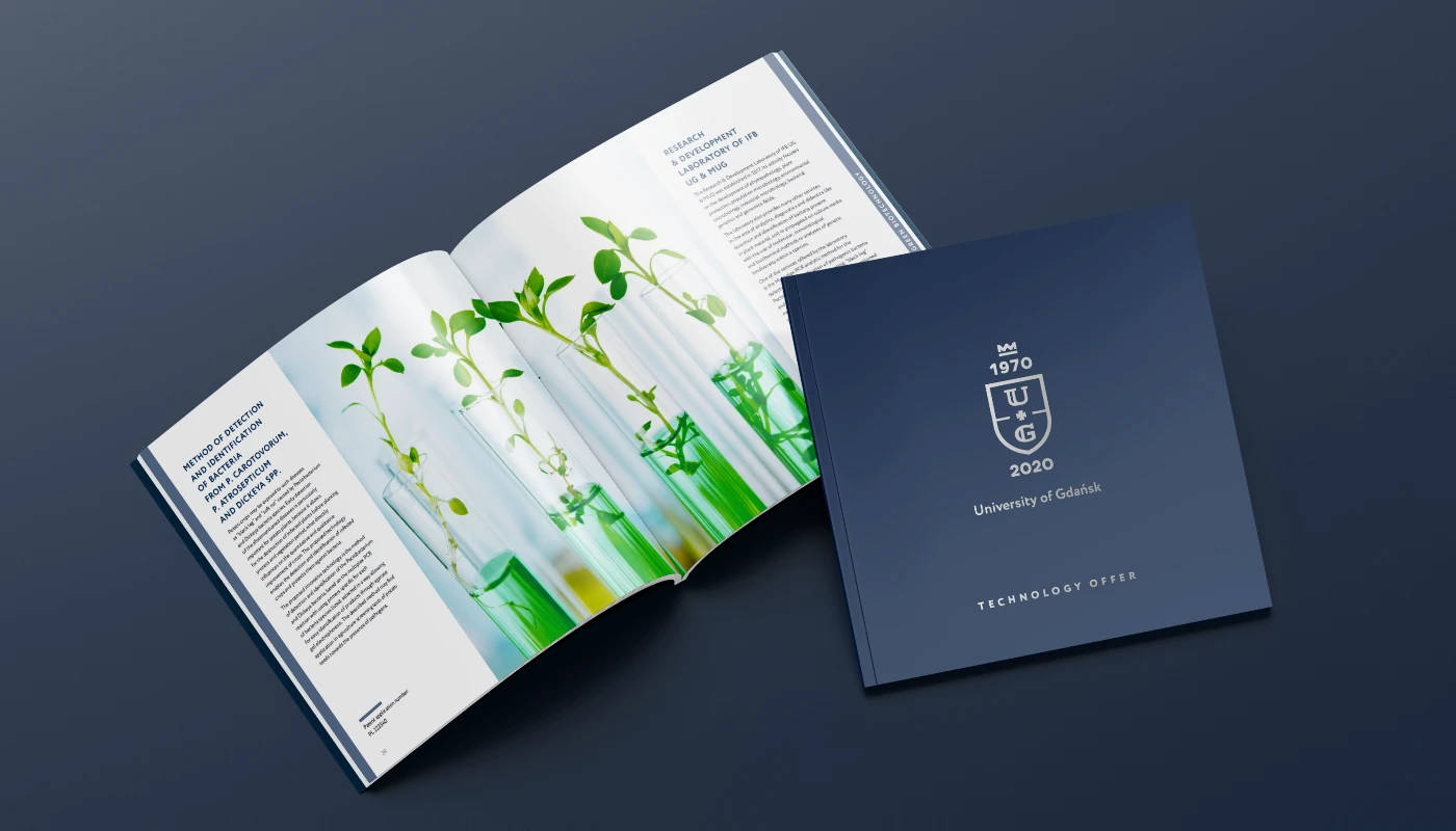 Open and closed university brochure with seedlings growing in test tubes and University of Gdańsk logo on the cover.