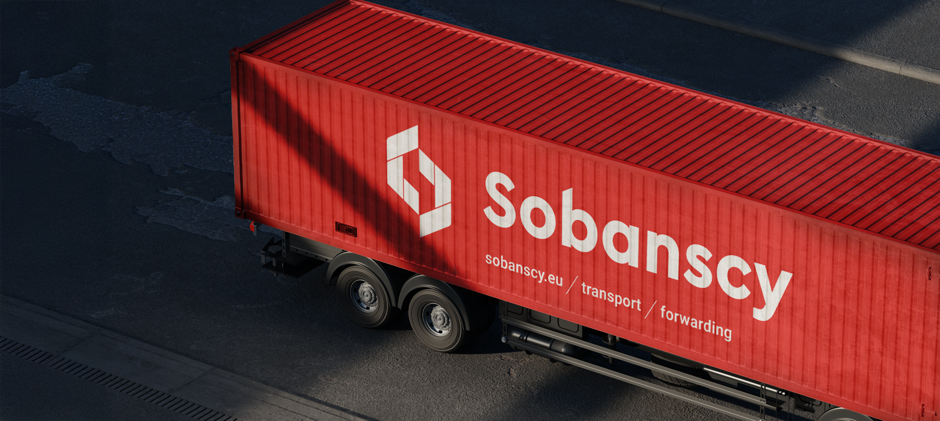 Red shipping container truck trailer with white Sobanscy logo and text reading sobanscy.eu transport forwarding.