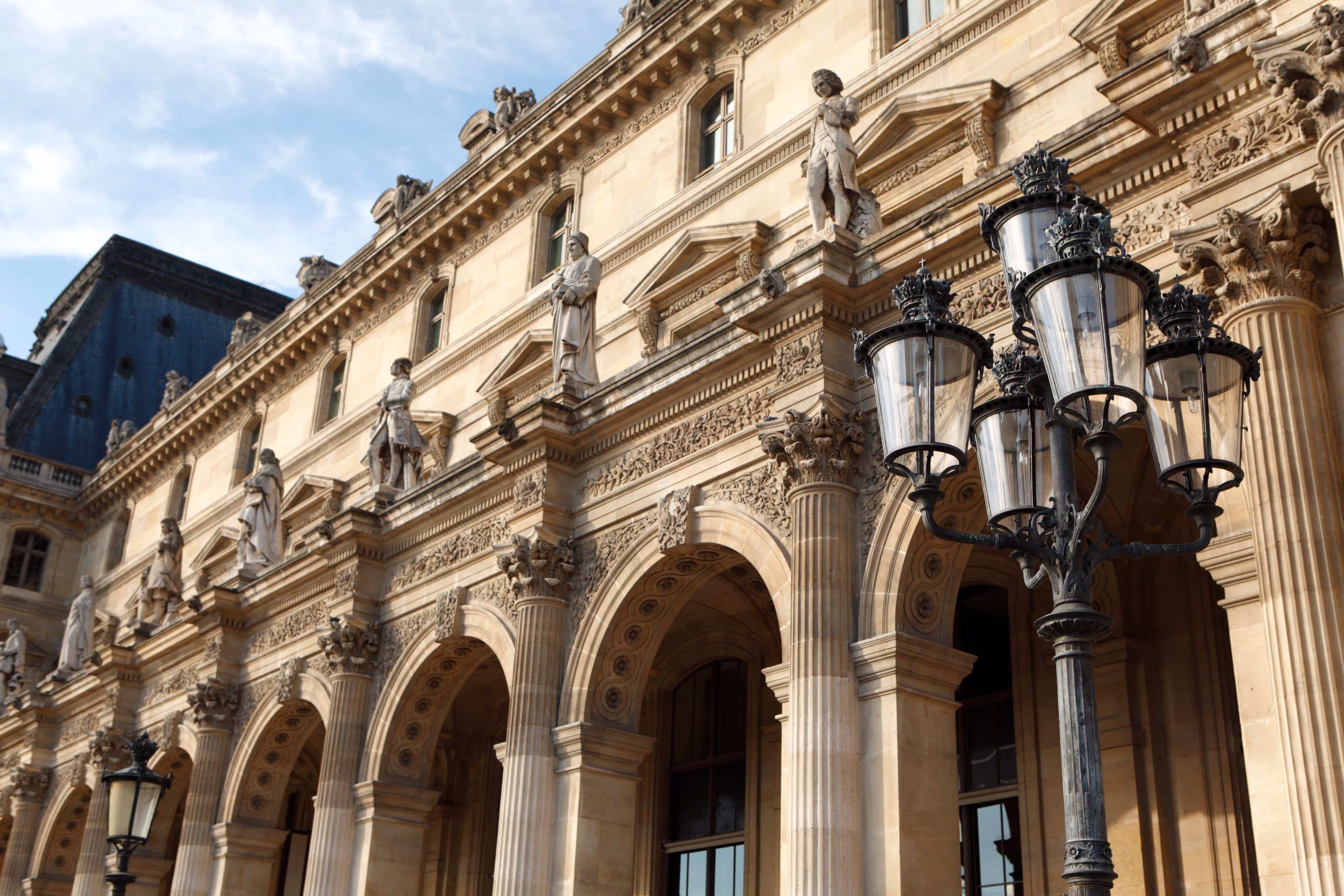 A large building with a clock on the front of it.
