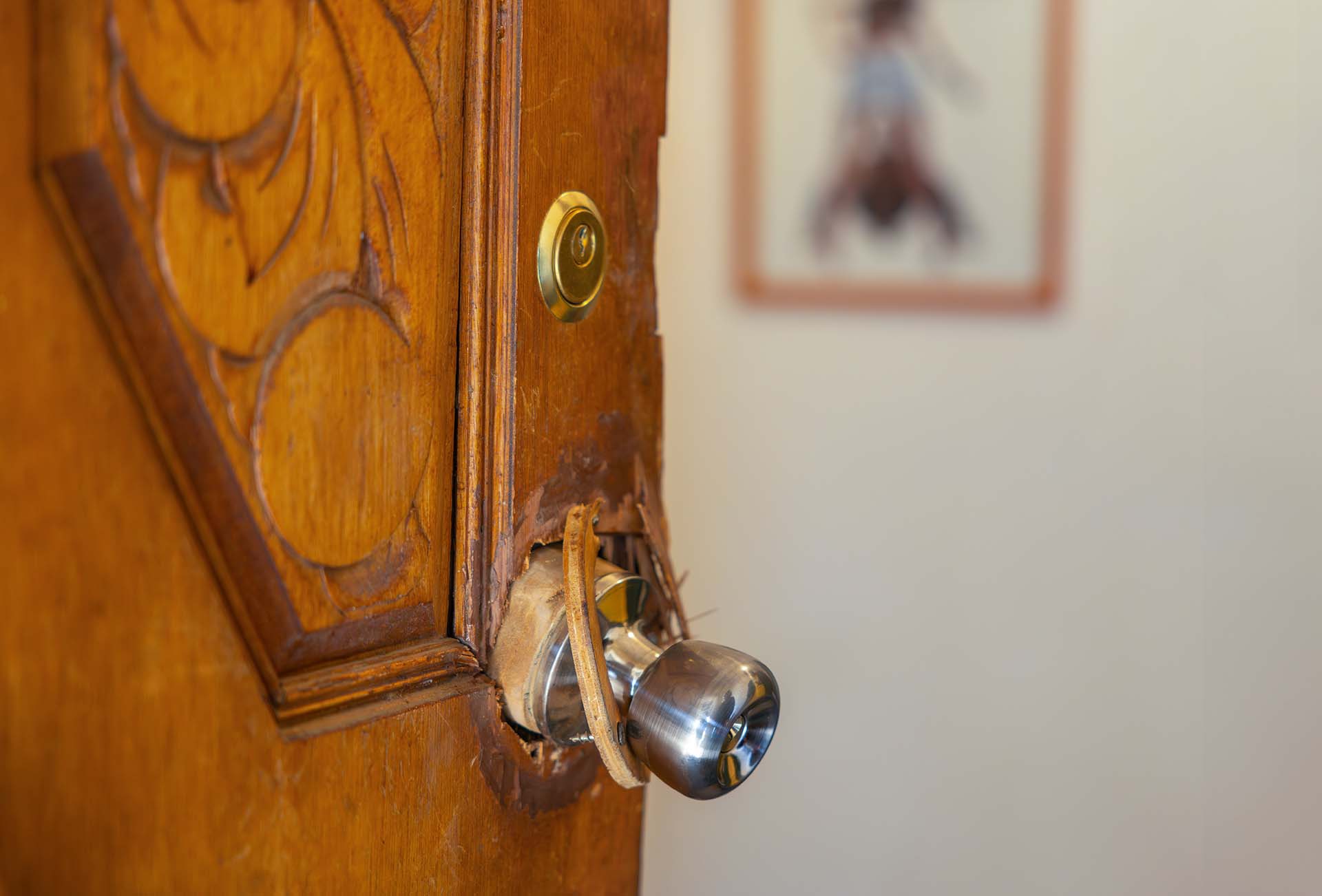 Broken lock on a front door 