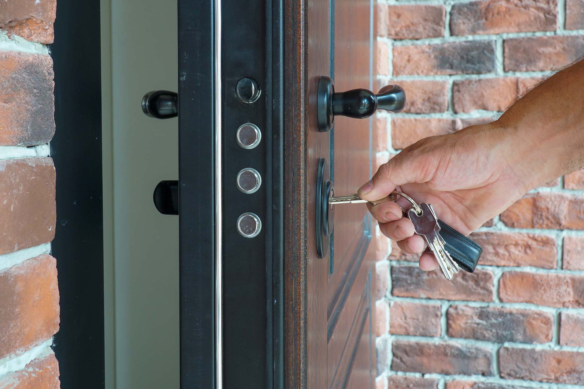 Someone unlocking their front door