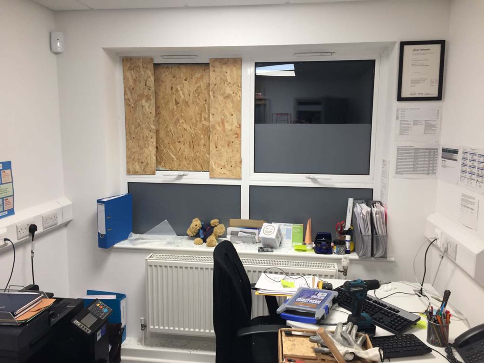 EBU boarded up office window.