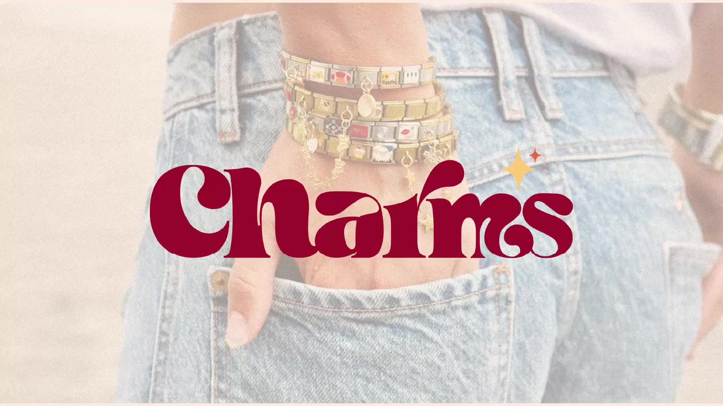 Charms logo over stacked charm bracelets