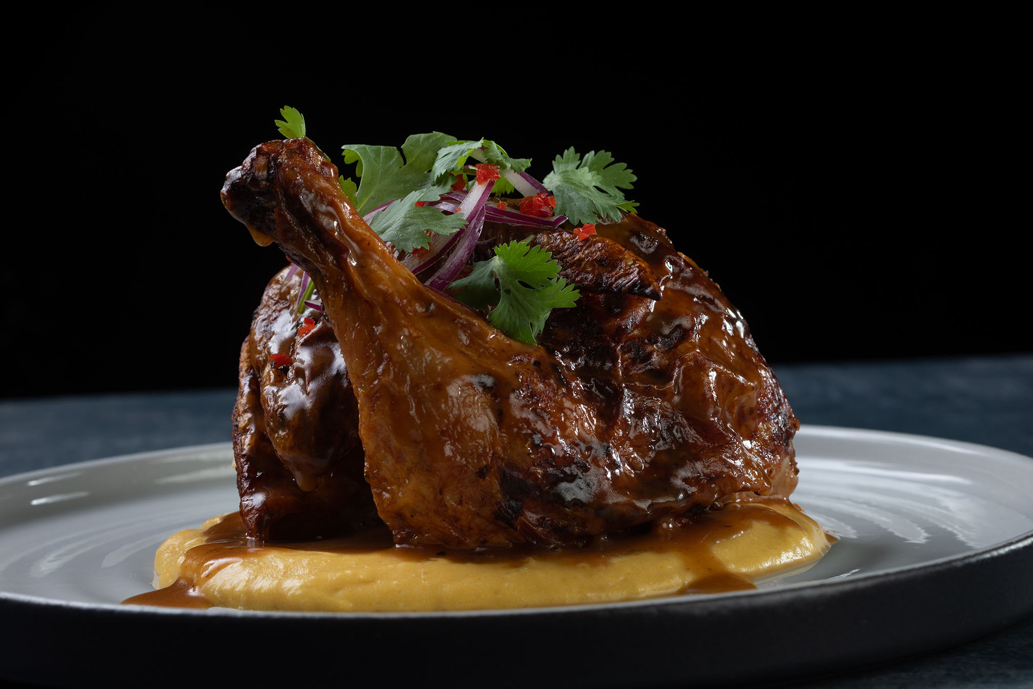Gourmet chicken dish at Kali Dining Room Orlando