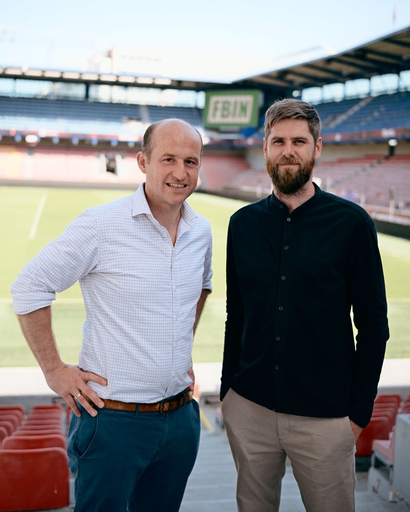 Thomas Maurer and Jan-Georg Streletzki standing together in a football stadium