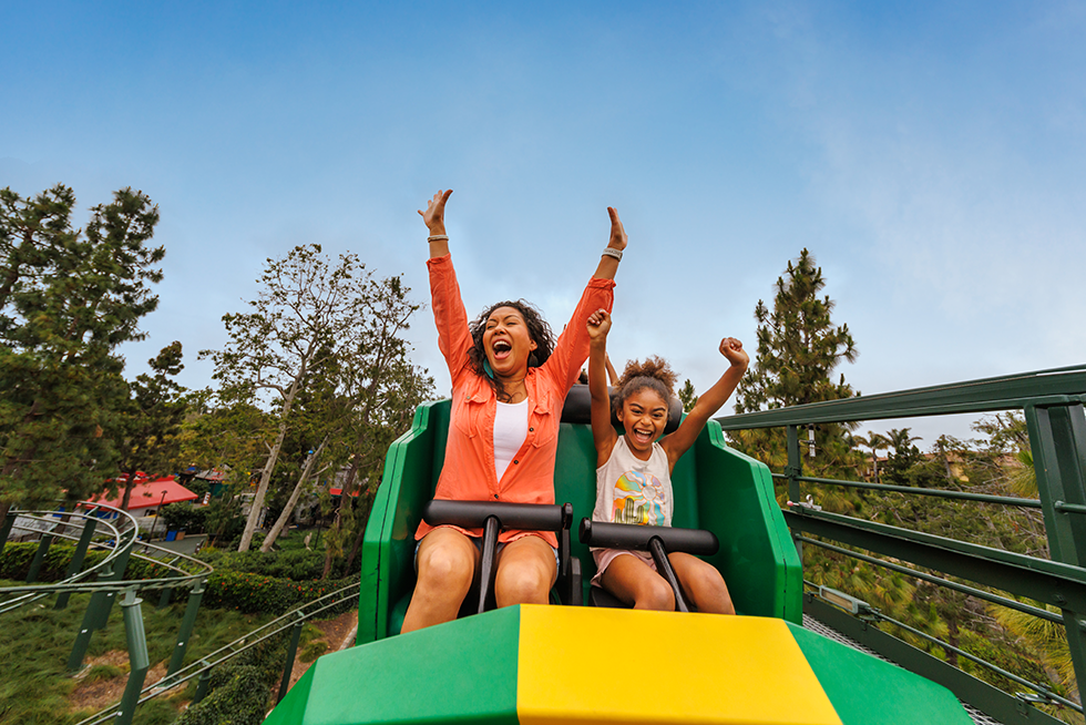 Mother and daughter on a rollercoaster