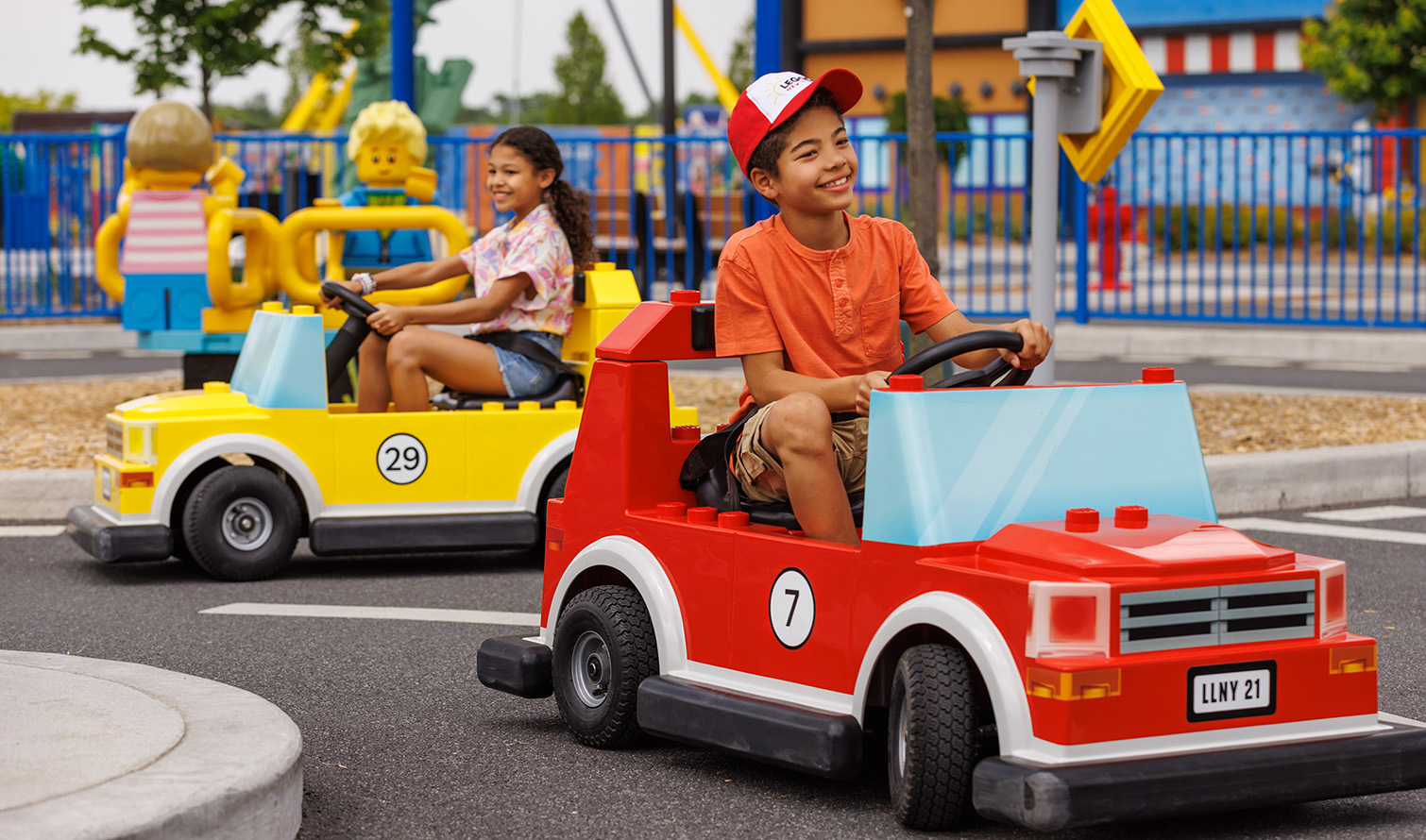 Children driving in lego cars