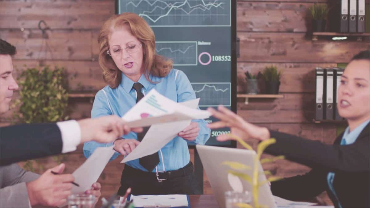 Office workers interacting with each other