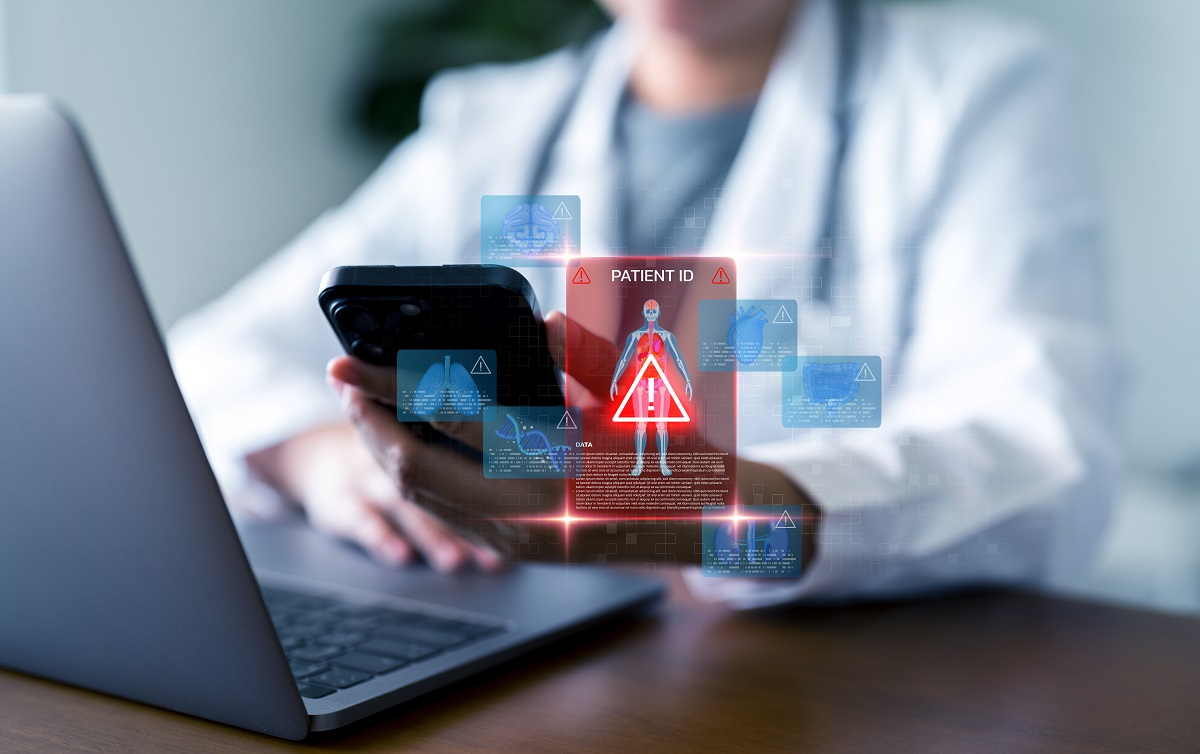 AI healthcare fraud detection alert showing patient identity risk and medical data on smartphone