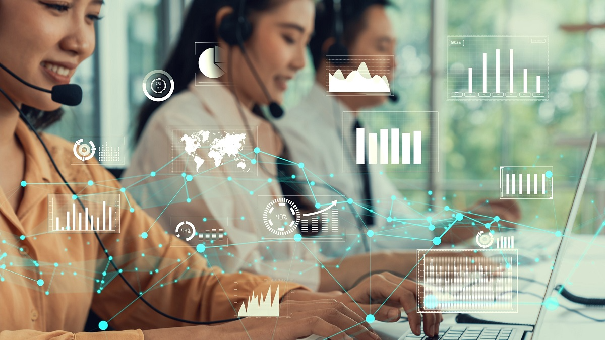 Contact center team using AI-powered call center analytics dashboards and real-time customer conversation monitoring tools
