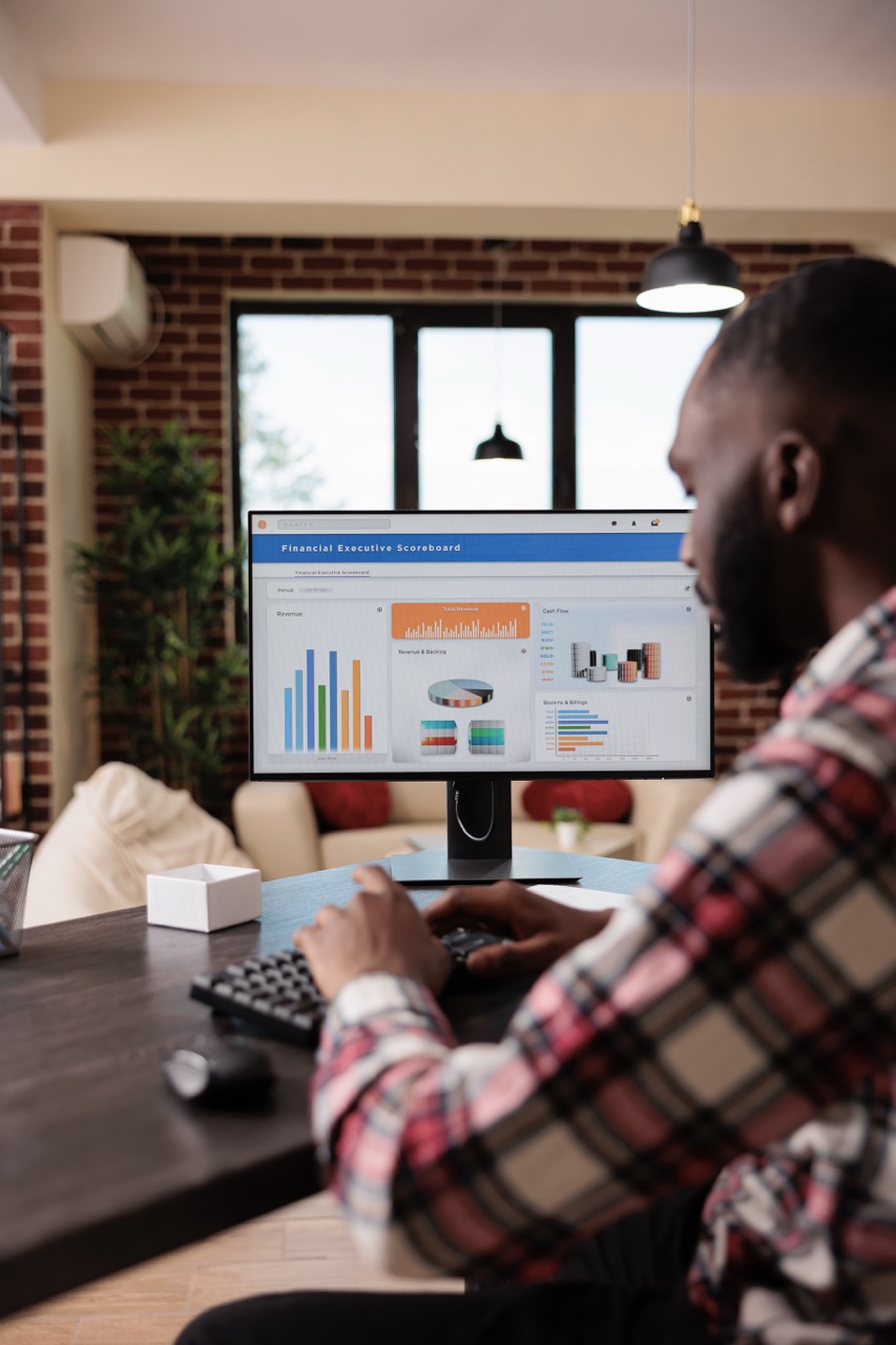 Man working and analyzing reports.