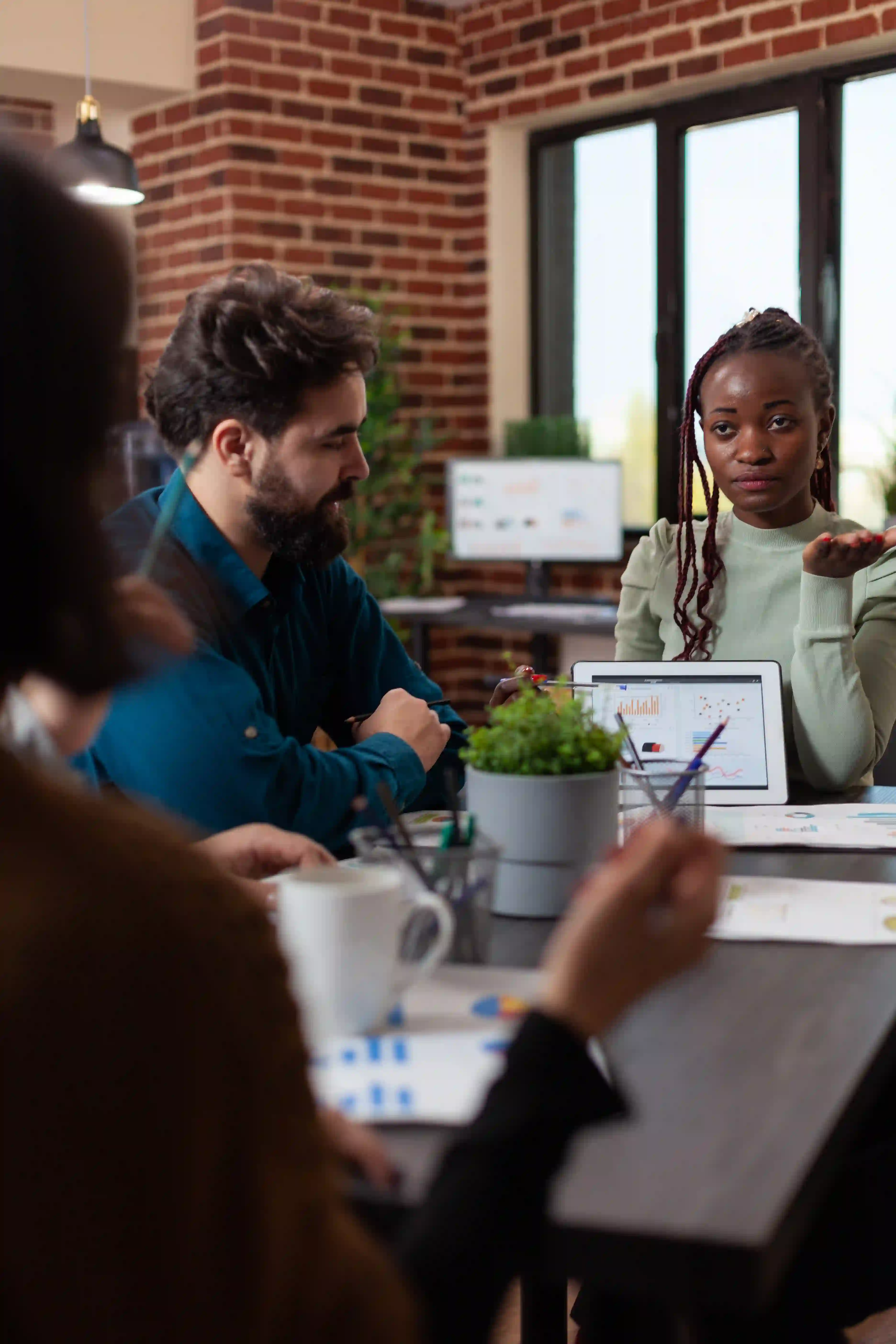 African american businesswoman showing marketing graphs