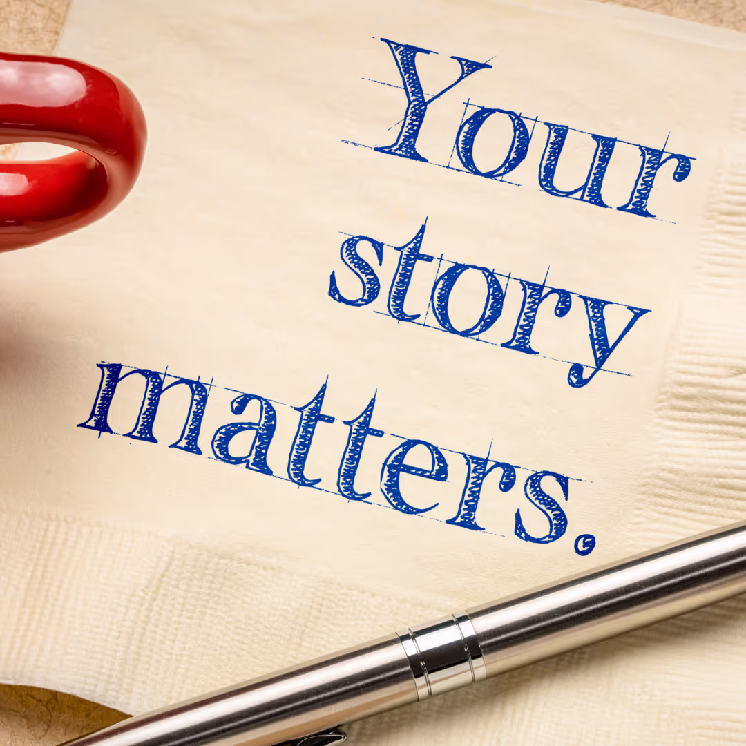 A napkin with the words "your story matters" printed on it next to a pen