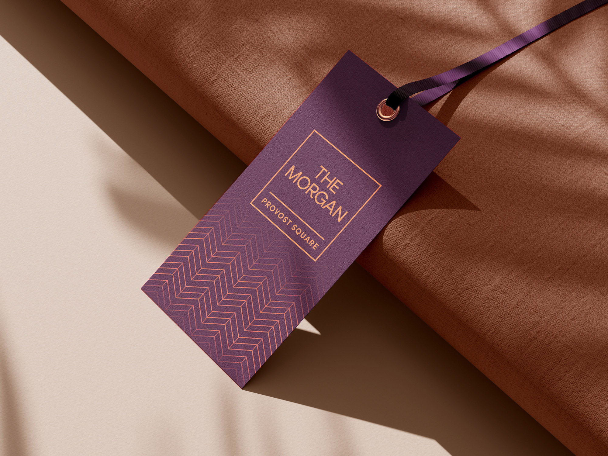 The Morgan Provost Square branded hang tag by Sabato Design
