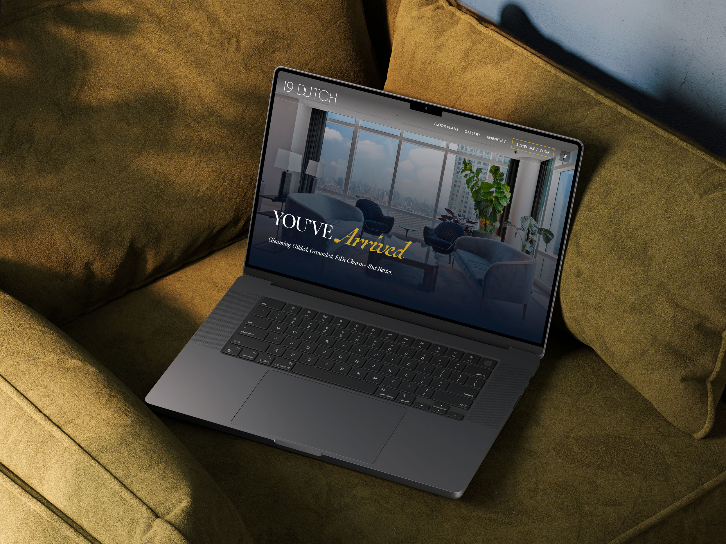 19 Dutch website shown on laptop in styled setting by Sabato Design