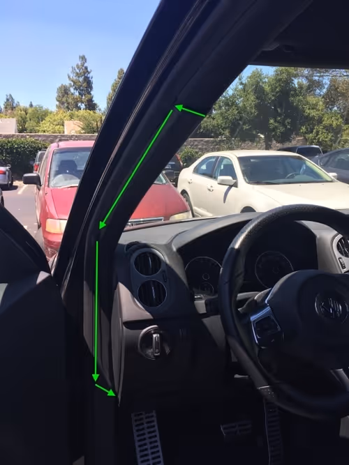 Wires hidden in the lining above the windshield