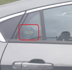 Round privacy sticker placed on a back passenger window