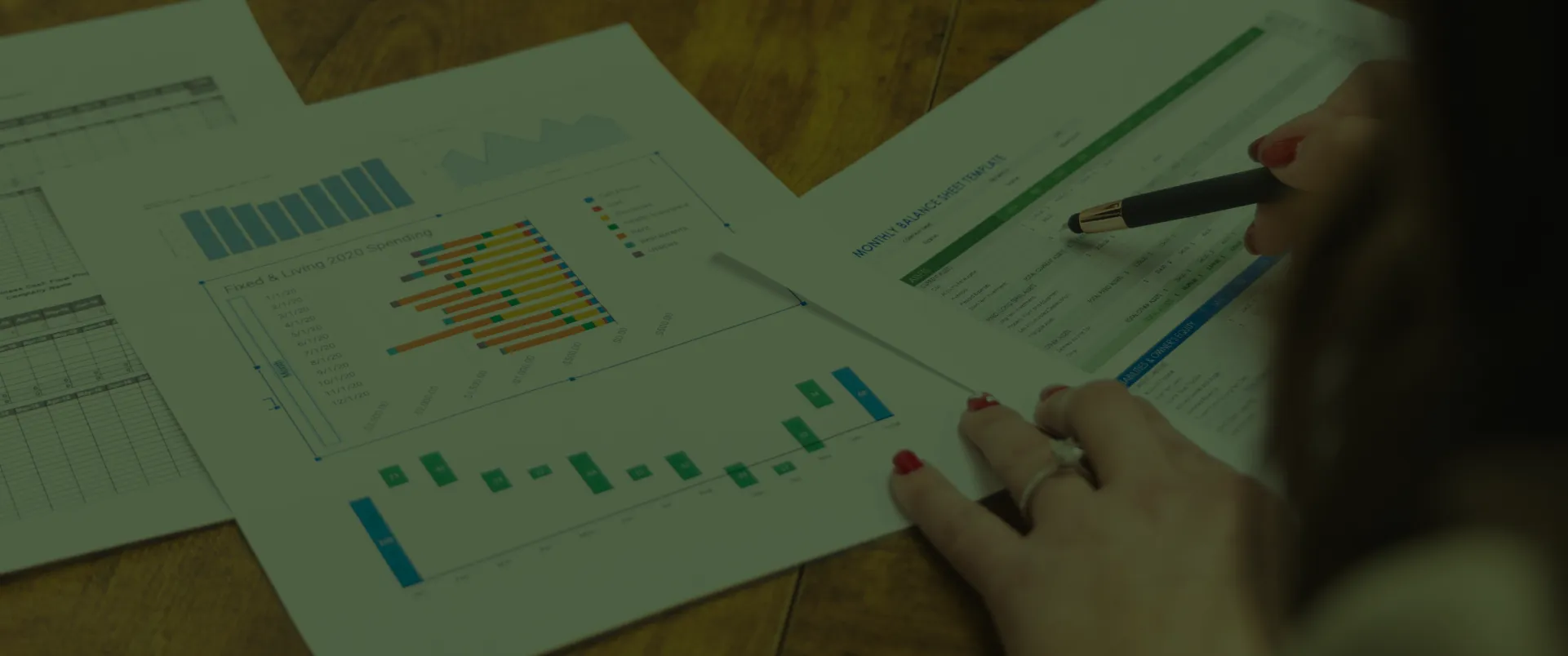 bookkeeping papers and figures green overlay