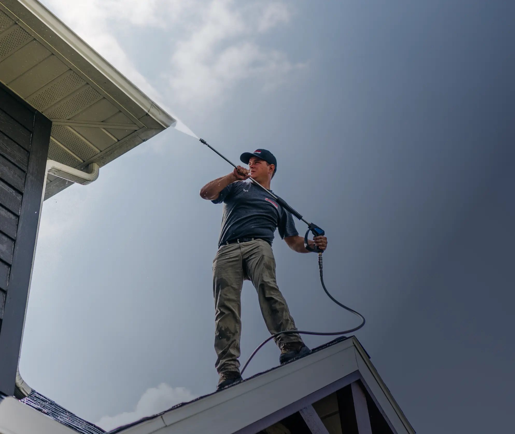 power washing residential home gutter system