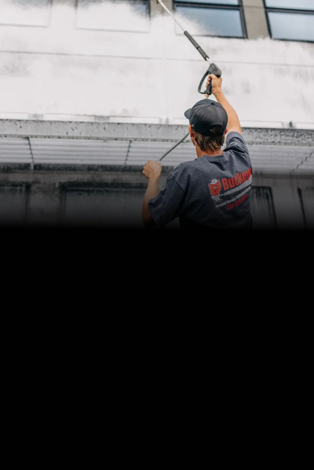 commercial building being power washed mobile