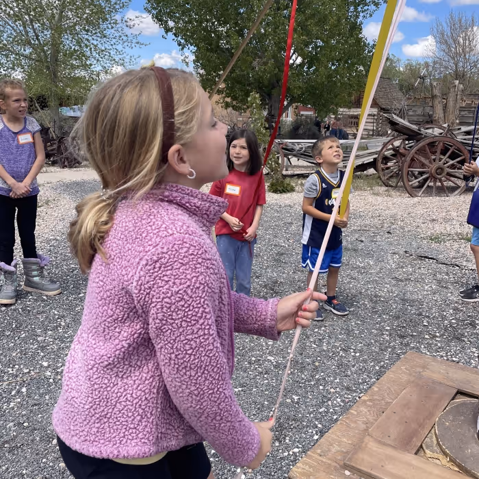 Young girl playing outside. 