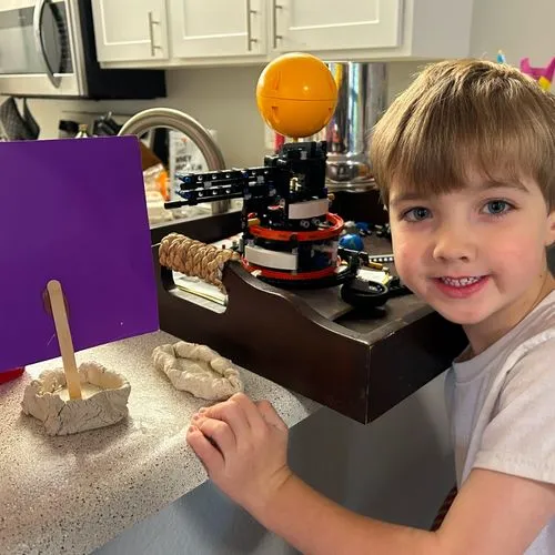 Young boy with craft