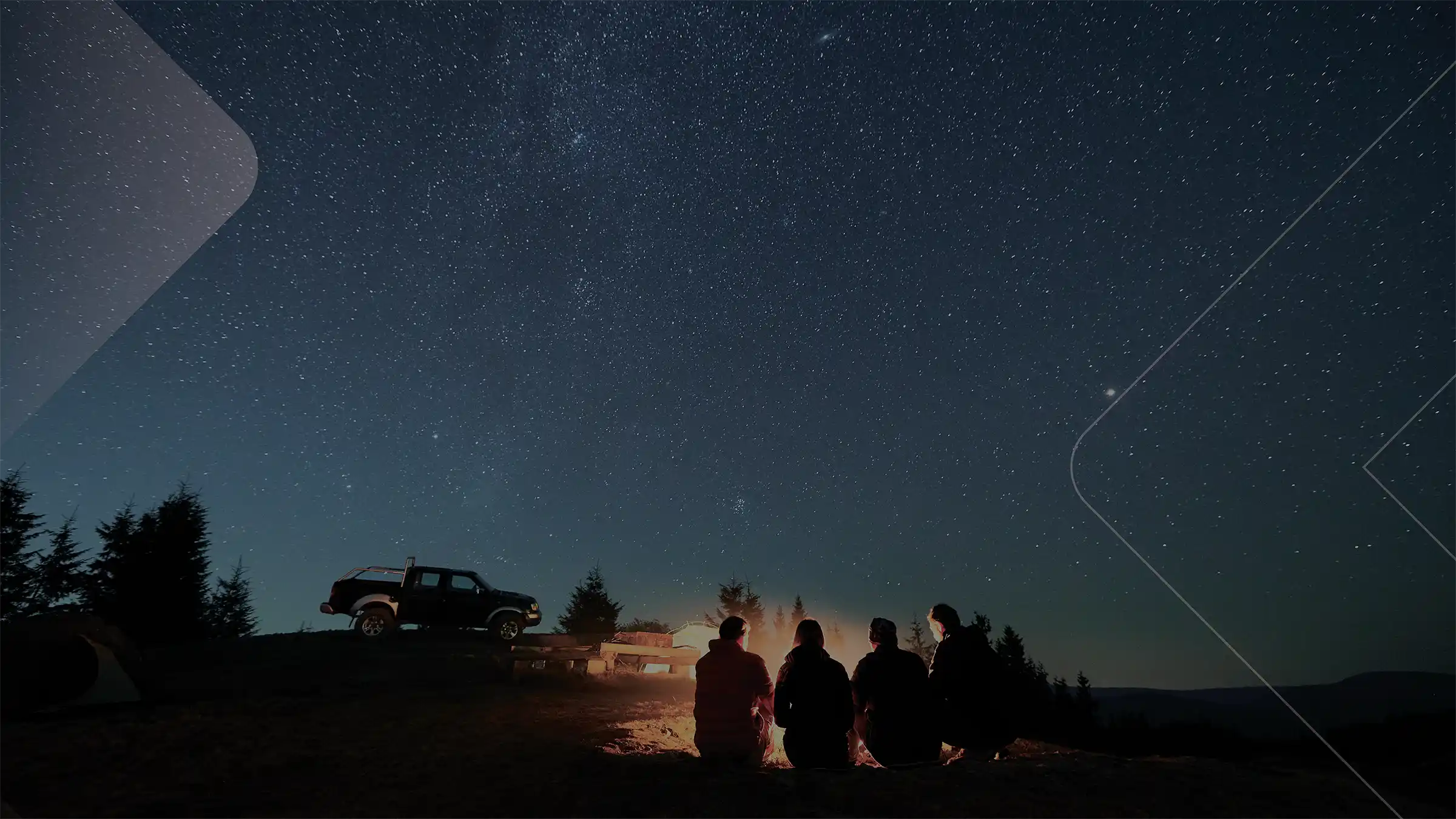 Friends camping at night