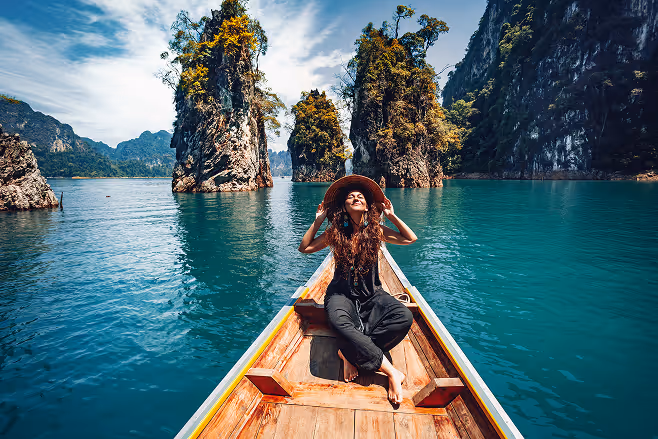 A woman smiling in a canoe