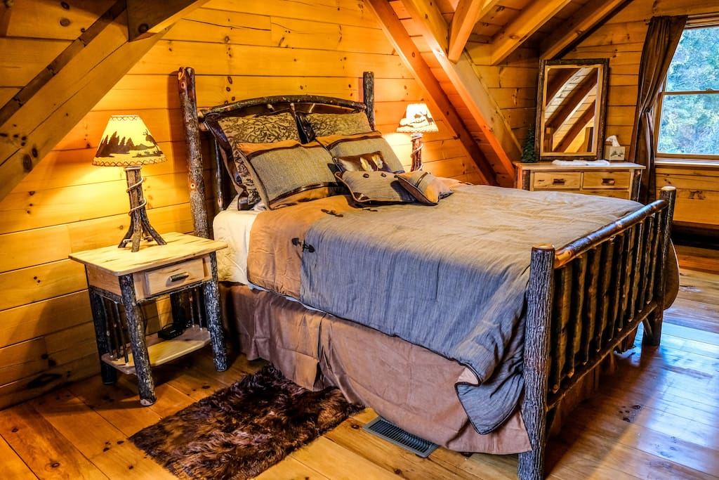 Queen bedroom suite in the loft of Deer Creek Cabin