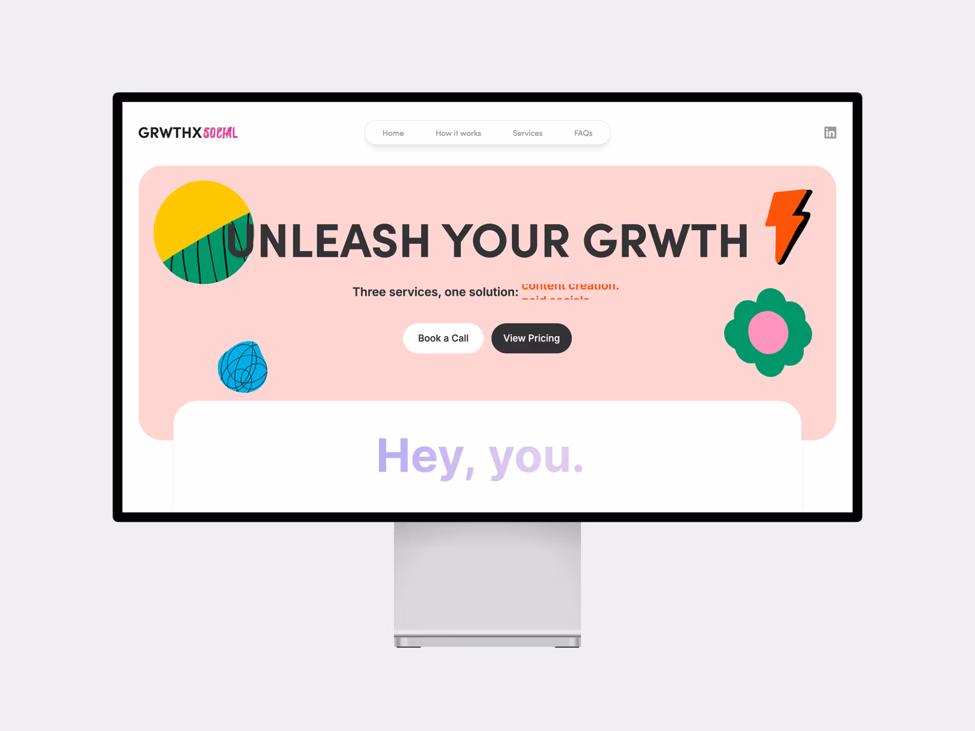 a mockup of the grwthx social  homepage on an apple pro display xdr