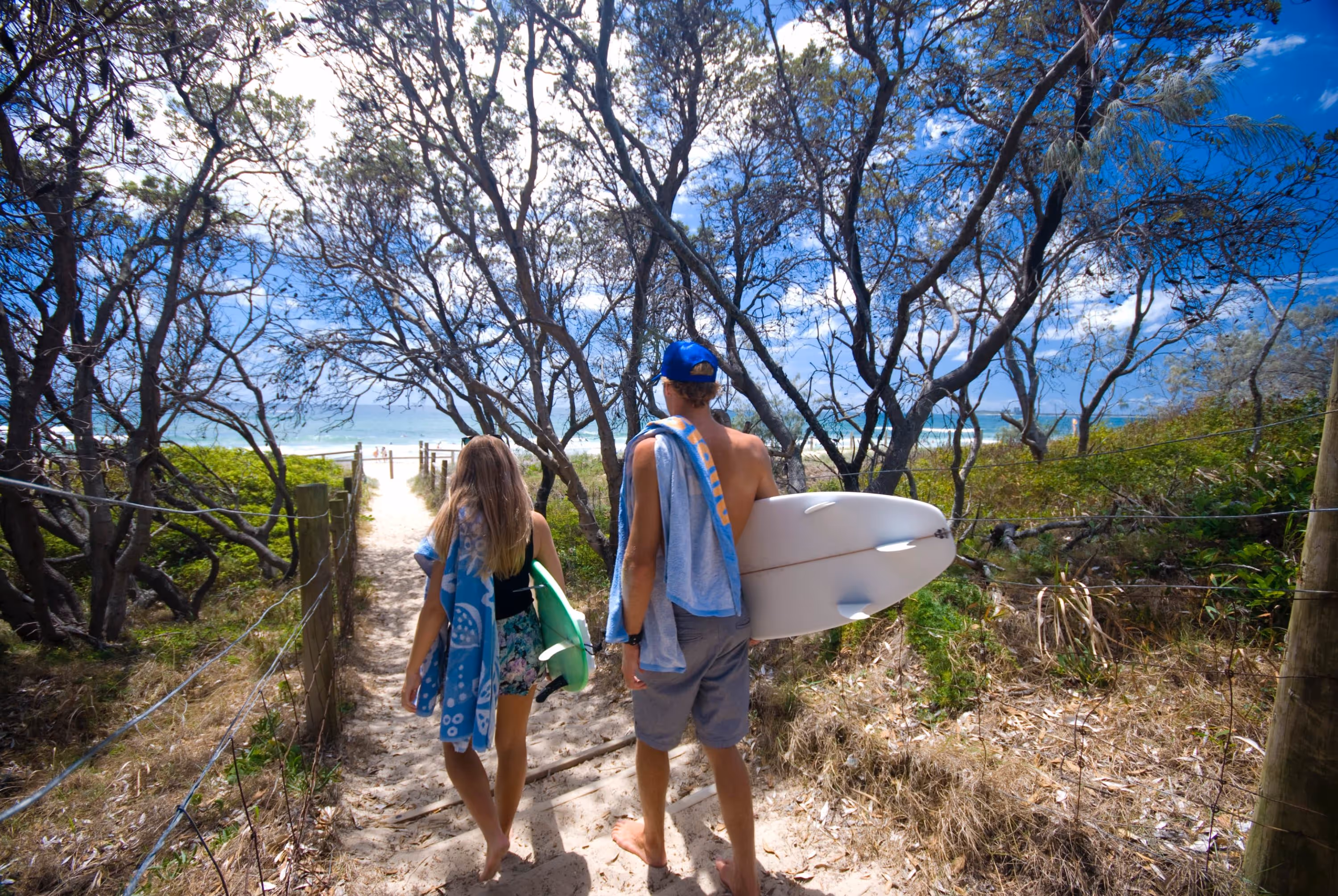 Majorca Isle Beachside Resort Surfers Going To Beach