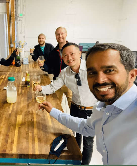 The Koya Medical team celebrates securing an A round with a toast 