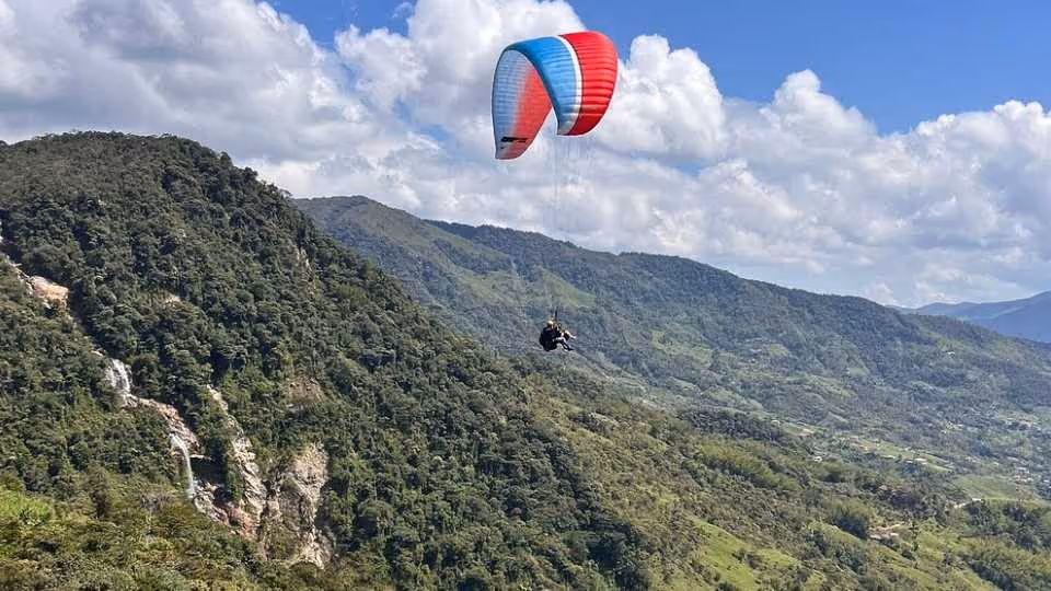Paragliding over giant waterfalls private tour (optional Guatape) from Medellin