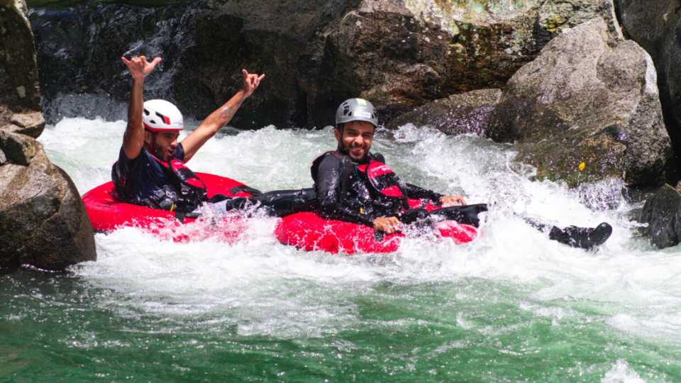 Paragliding and river tubing private experience from Guatape