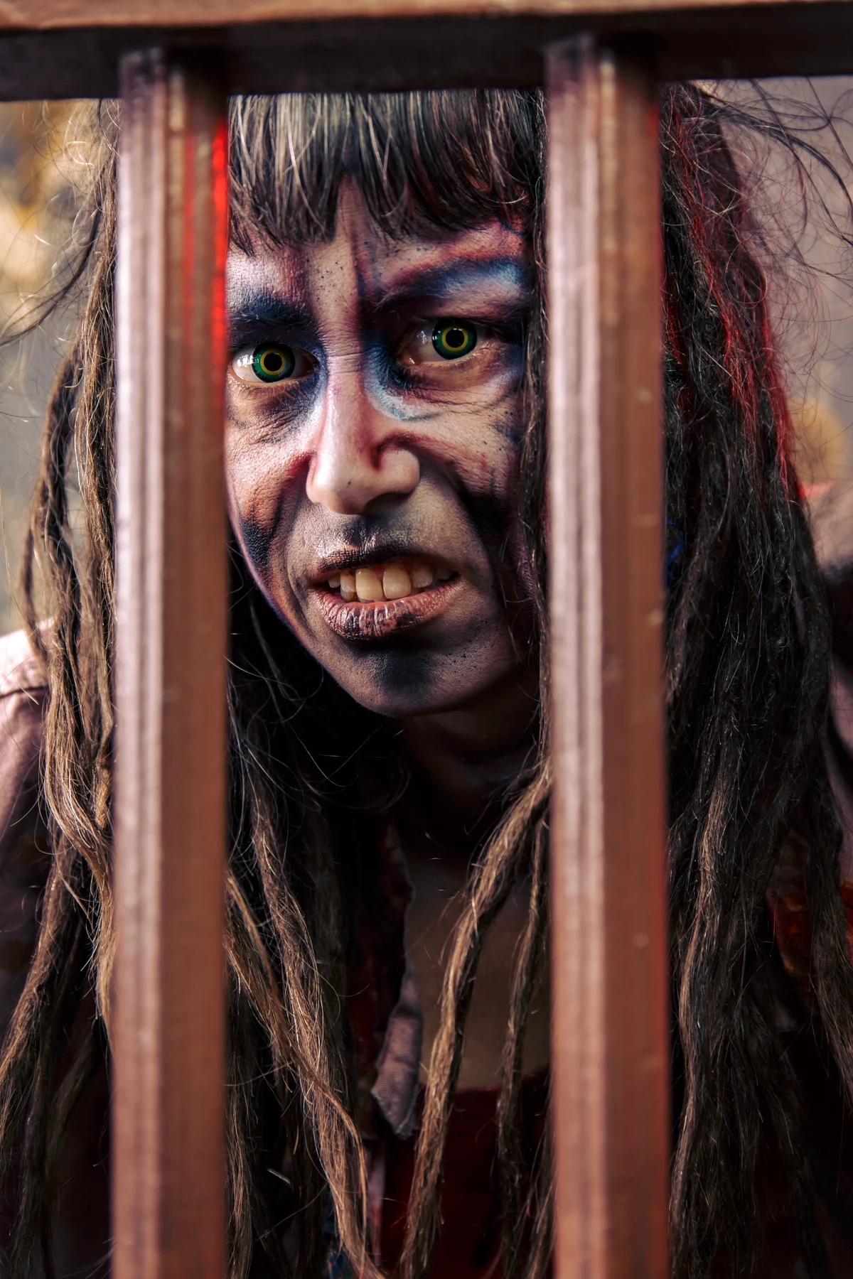 A Dark Prison character behind the bars