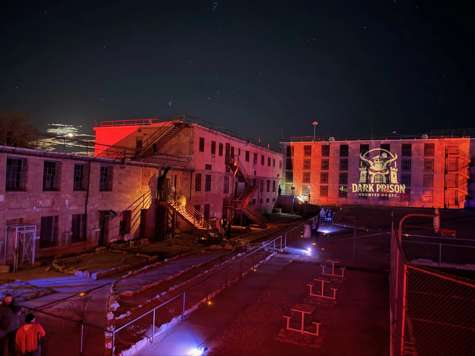 The Nevada State Prison yard illuminated during a night at Dark Prison