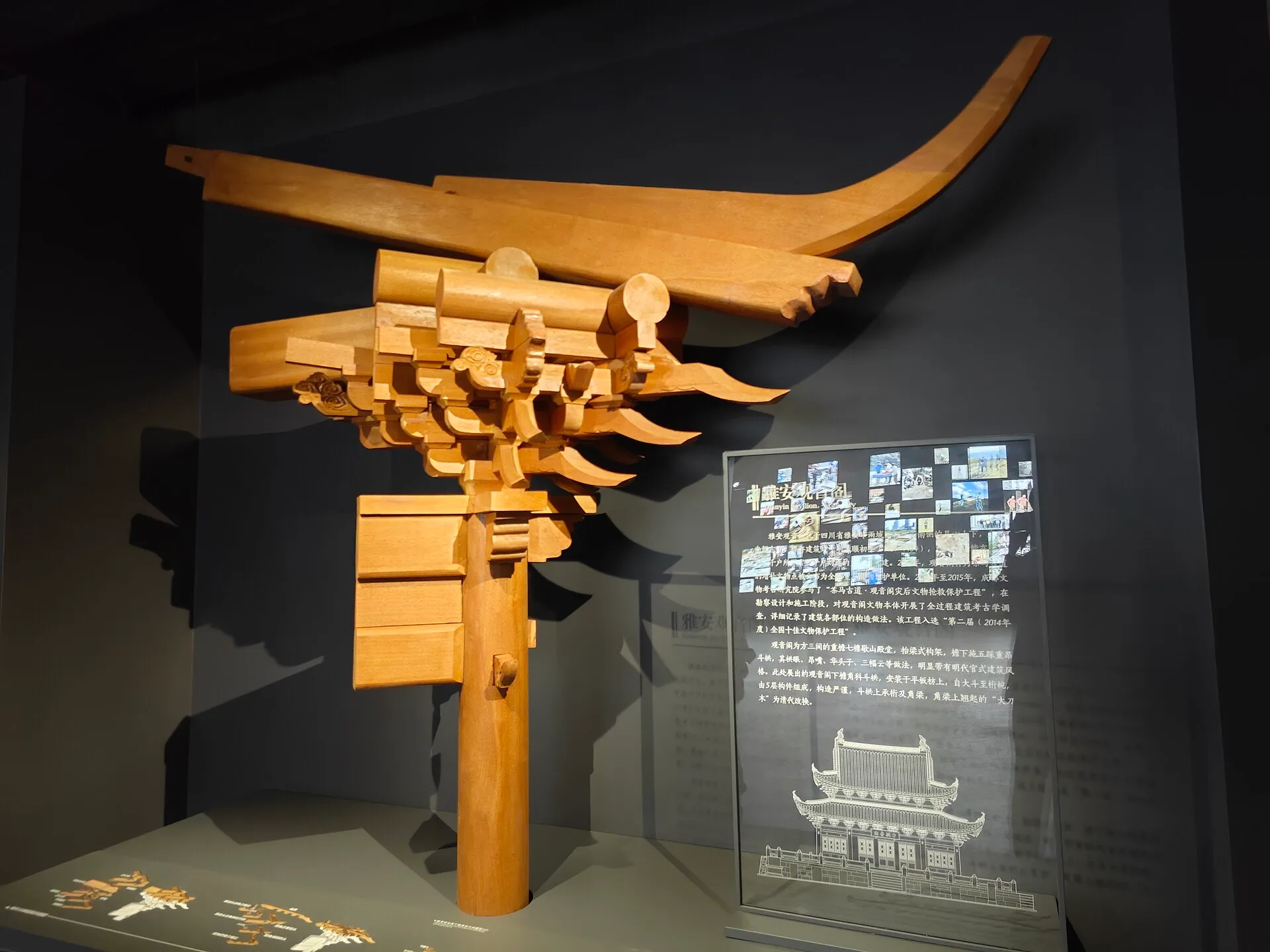 Wooden model of a Chinese corner bracket set with stacked blocks and arms