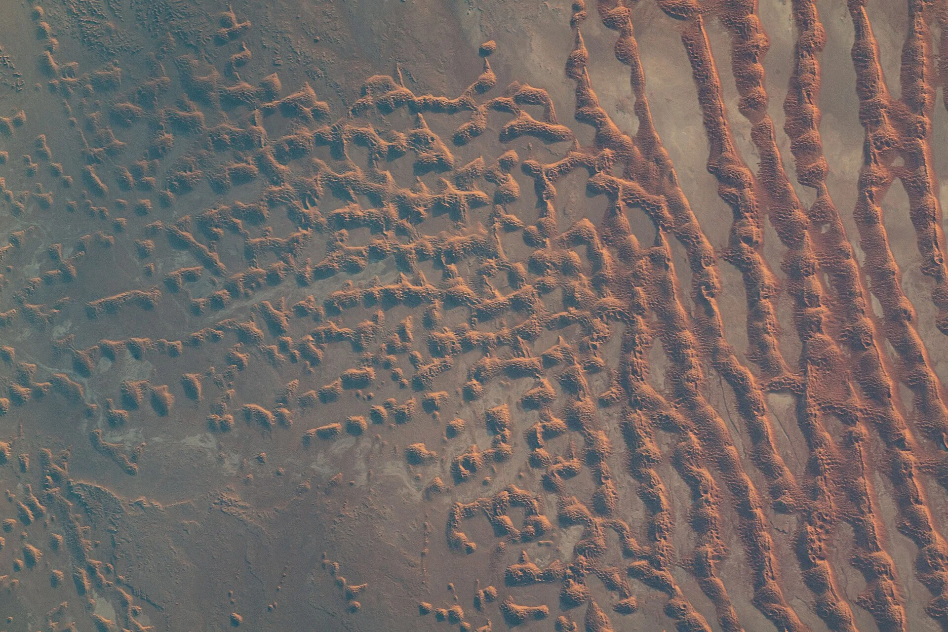 Astronaut view of sand dunes along the border between Saudi Arabia and Oman