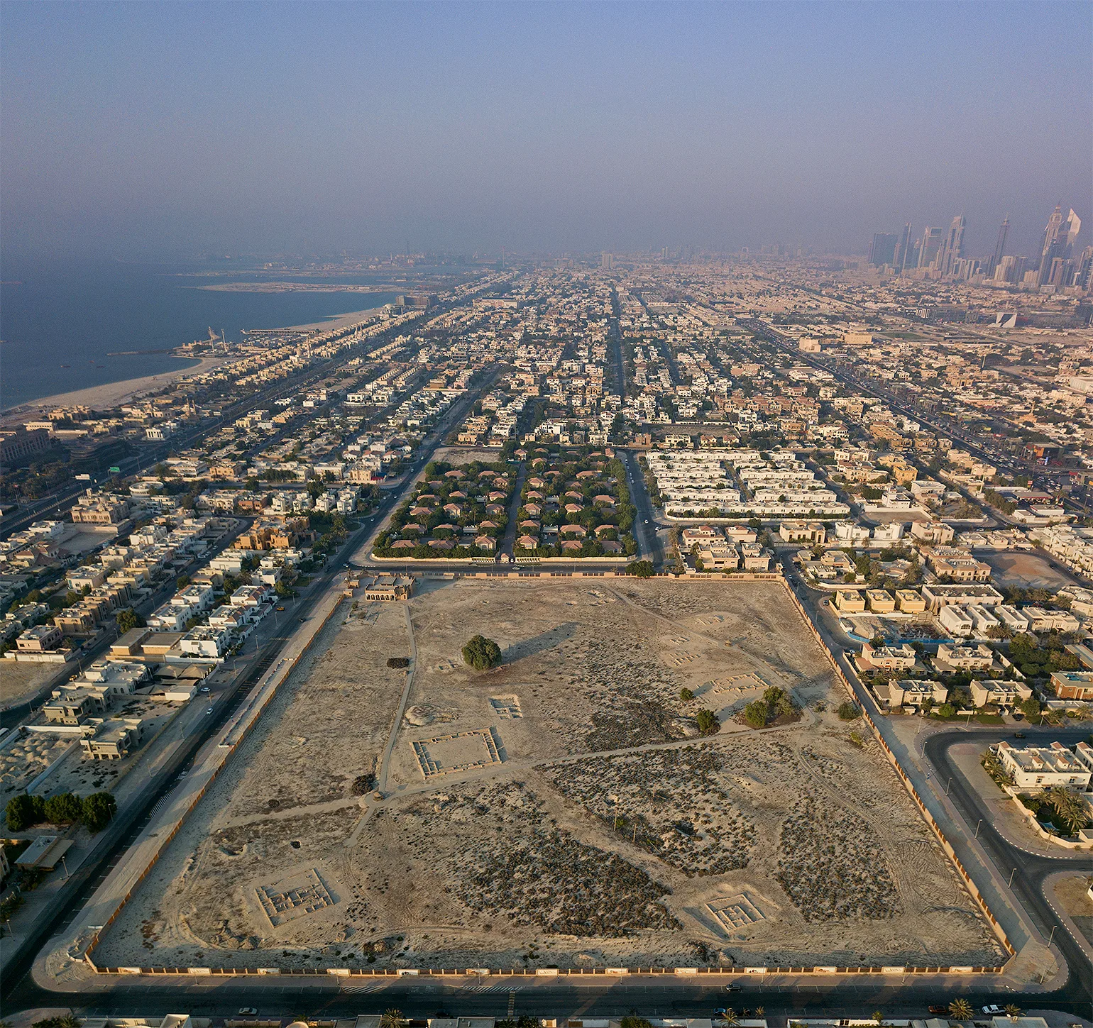 Aerial view of the excavated stone foundations at the Jumeirah Archaeological Site in Dubai