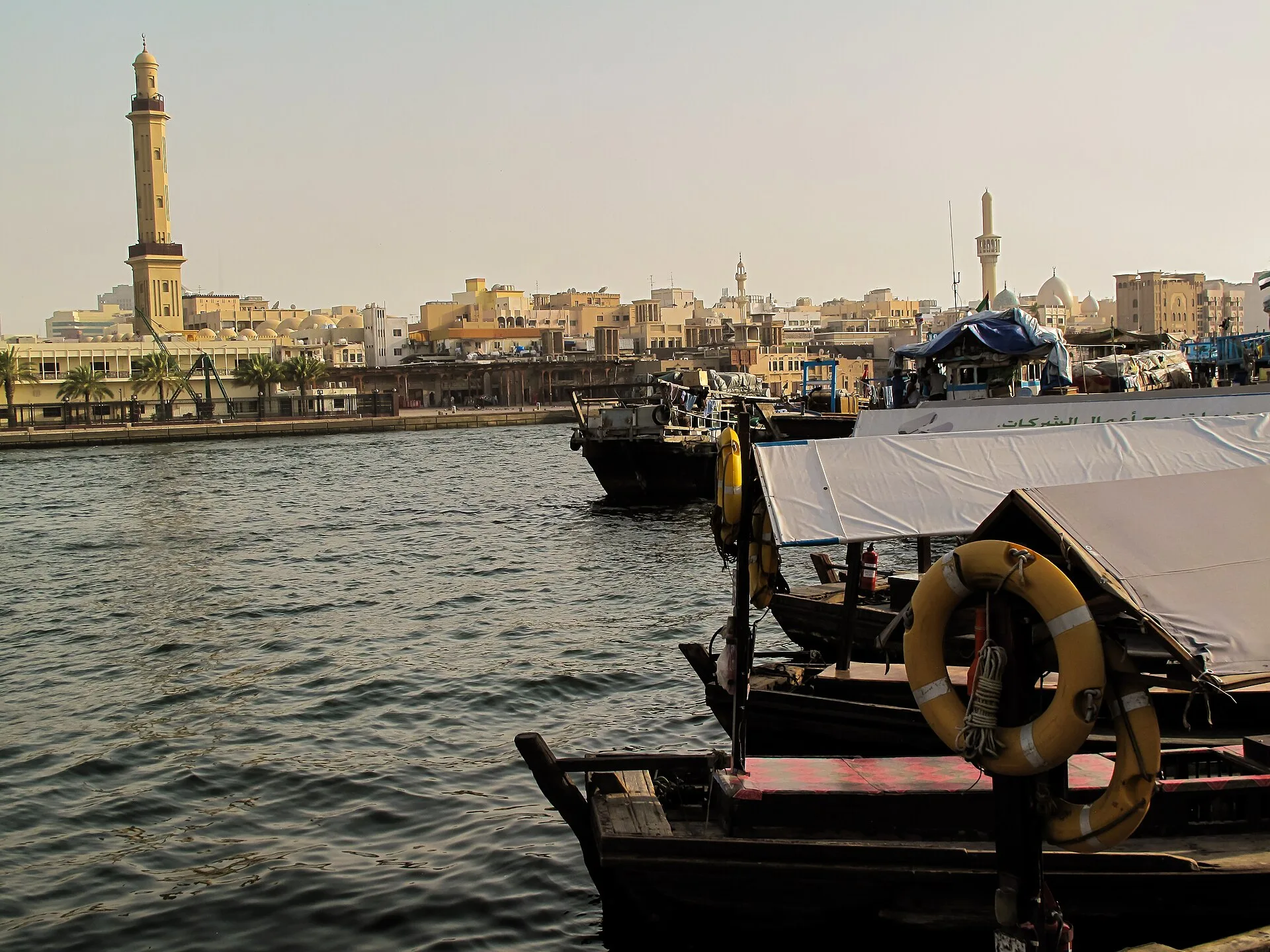 Wooden dhows moored along Dubai Creek