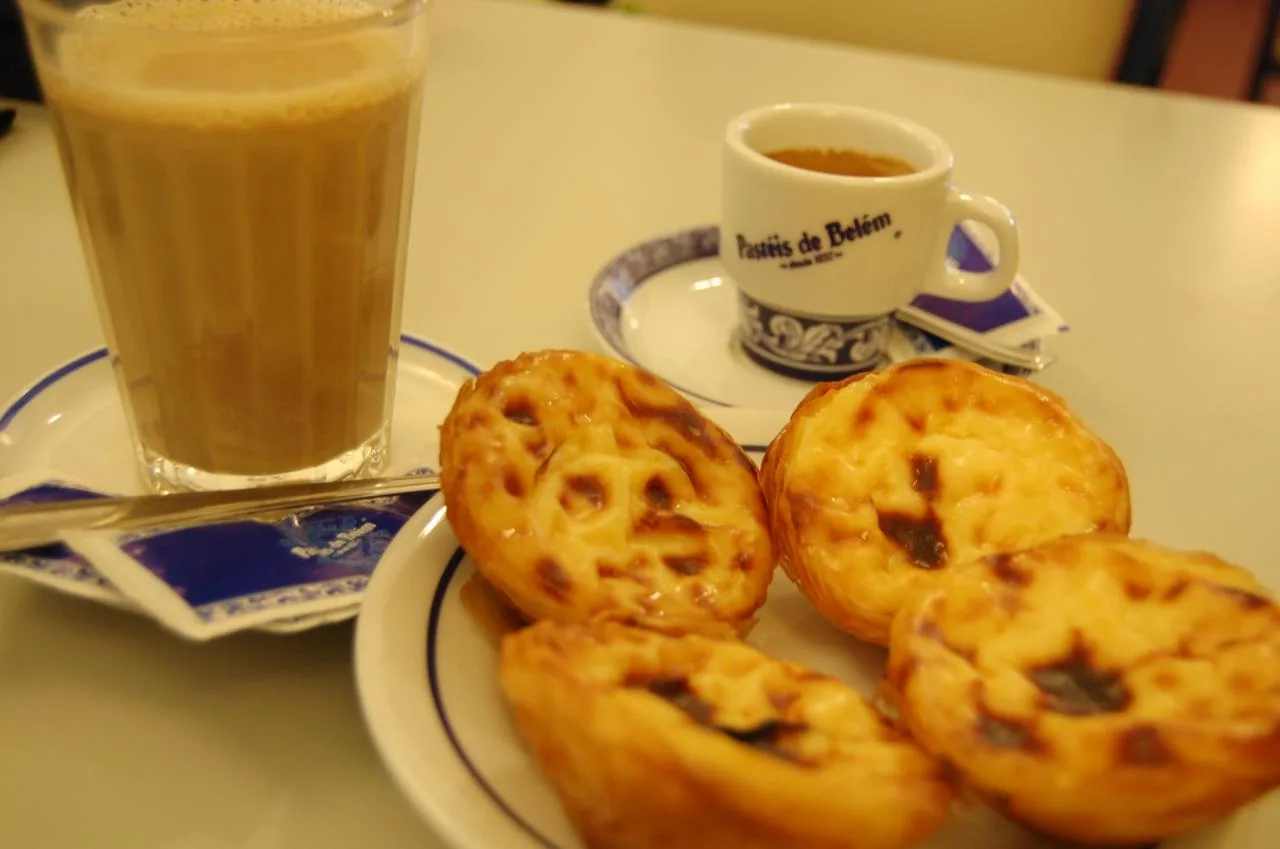 Portuguese custard tart on a plate at Pastéis de Belém