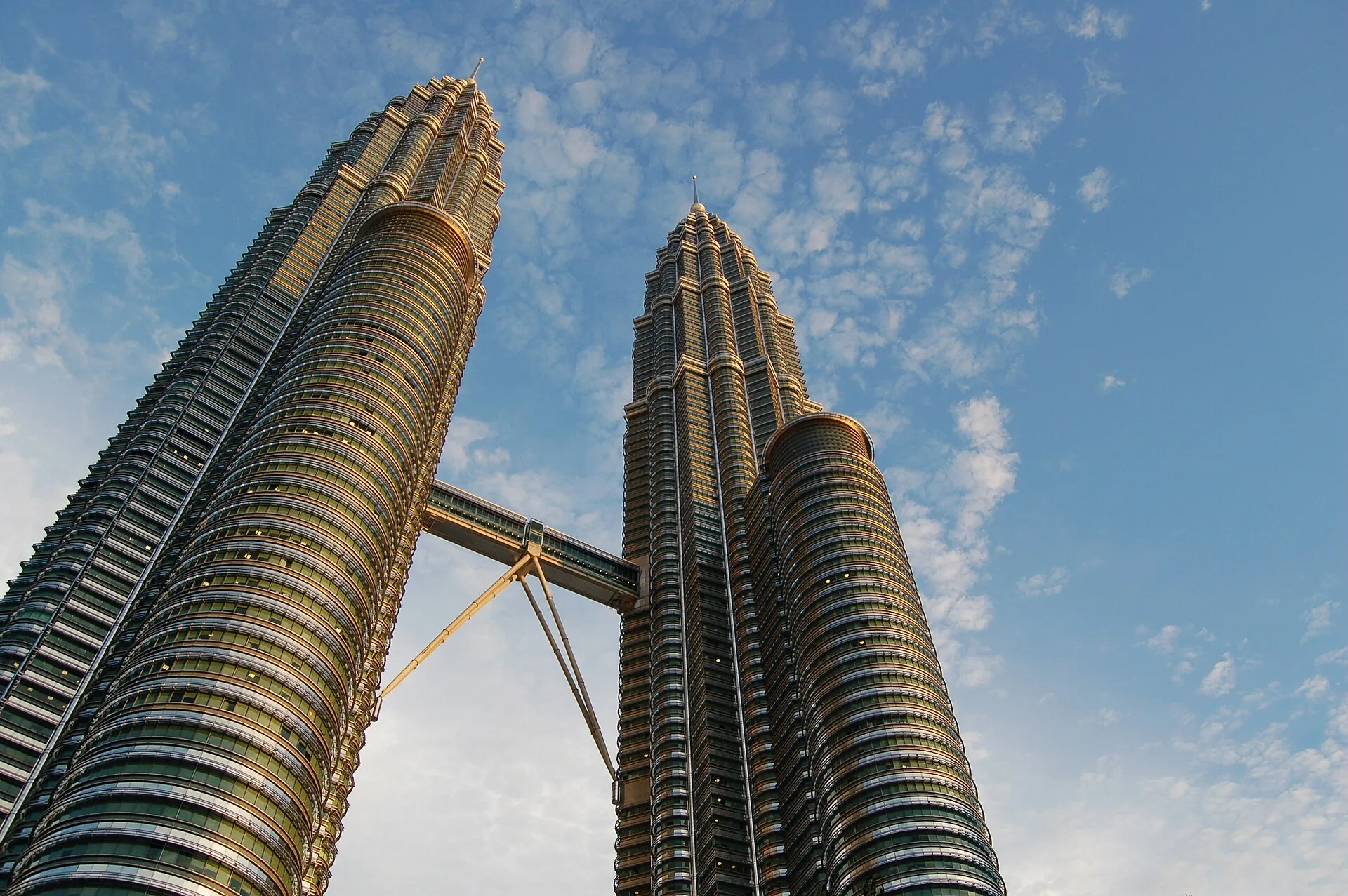 The twin steel and glass Petronas Towers in Kuala Lumpur by day
