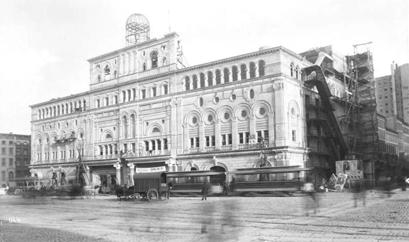 1895 photograph of the Olympia theatre building in Longacre Square