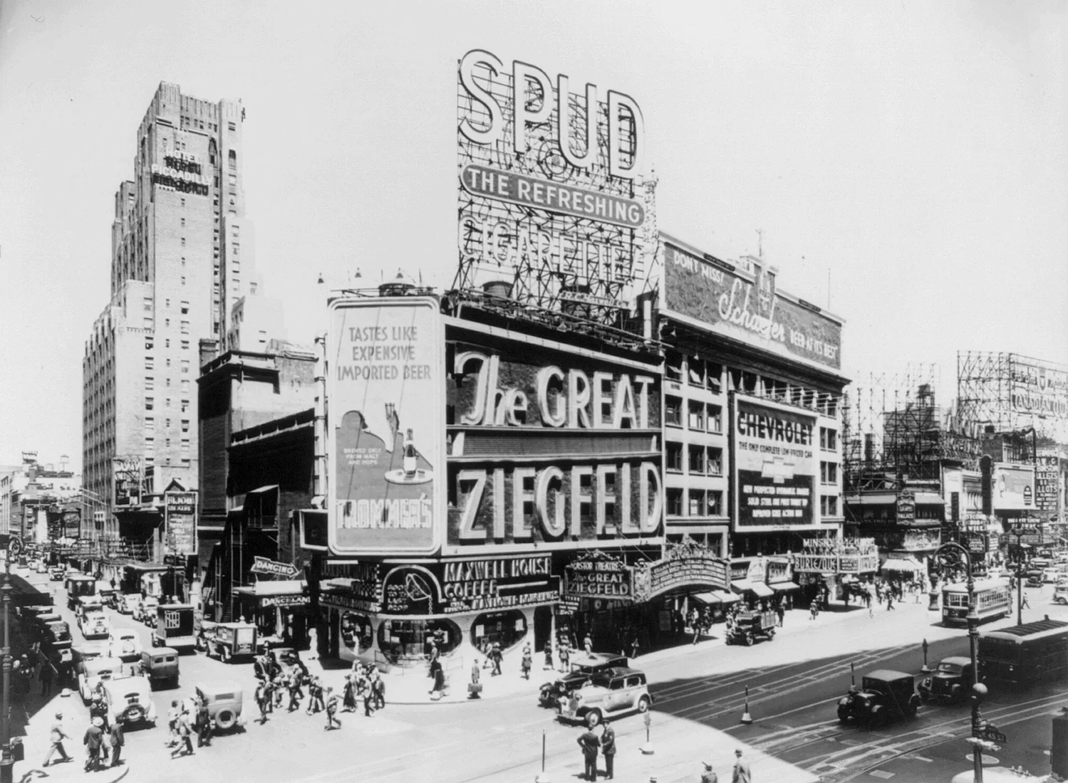 Times Square in 1936 with a large film sign above the Astor Theatre on Broadway