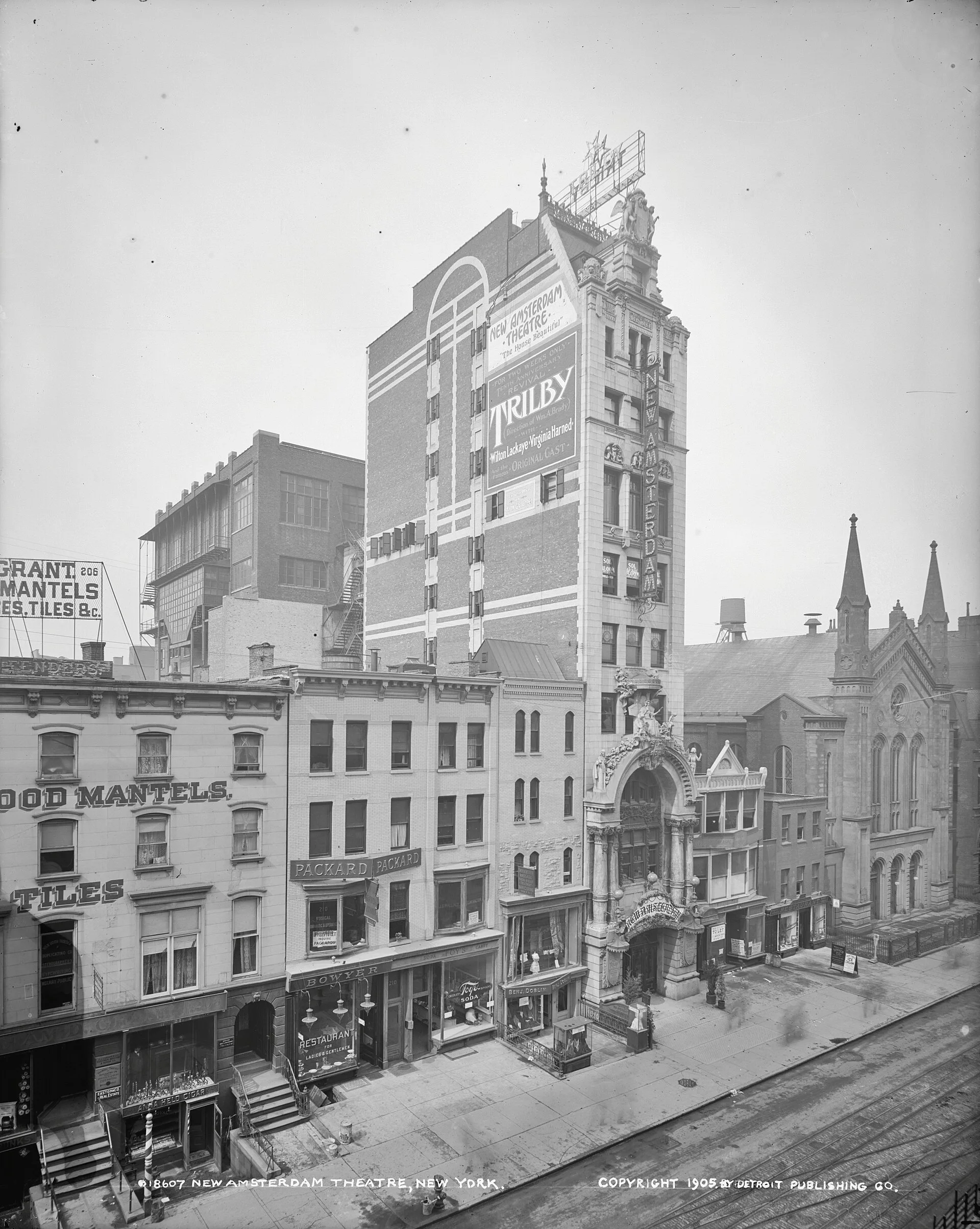 Historic photograph of the ornate New Amsterdam Theatre facade on 42nd Street