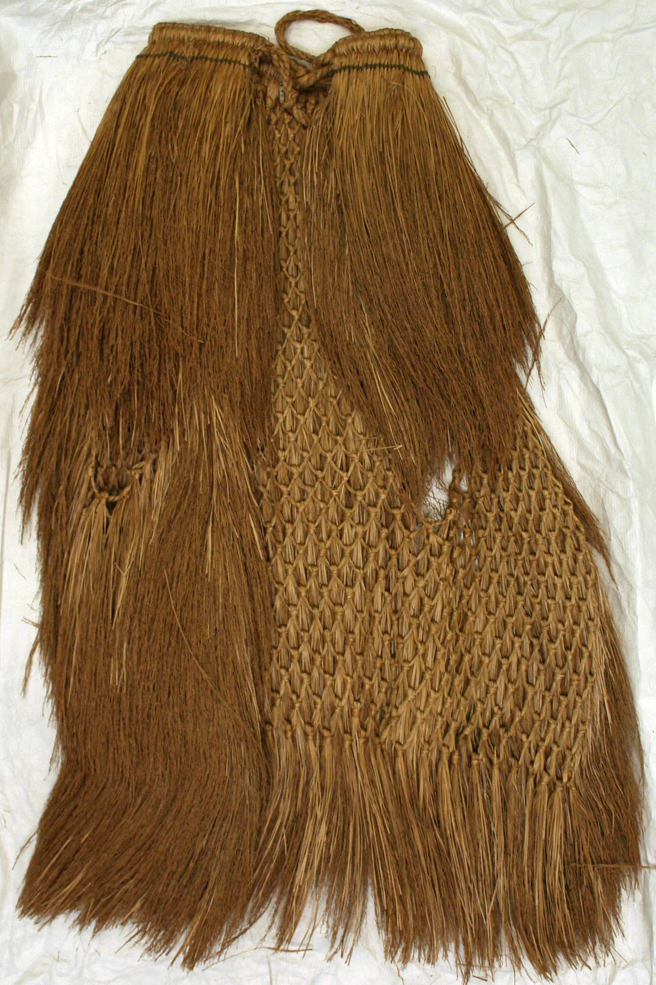 Traditional Japanese fibre rain cape shown flat
