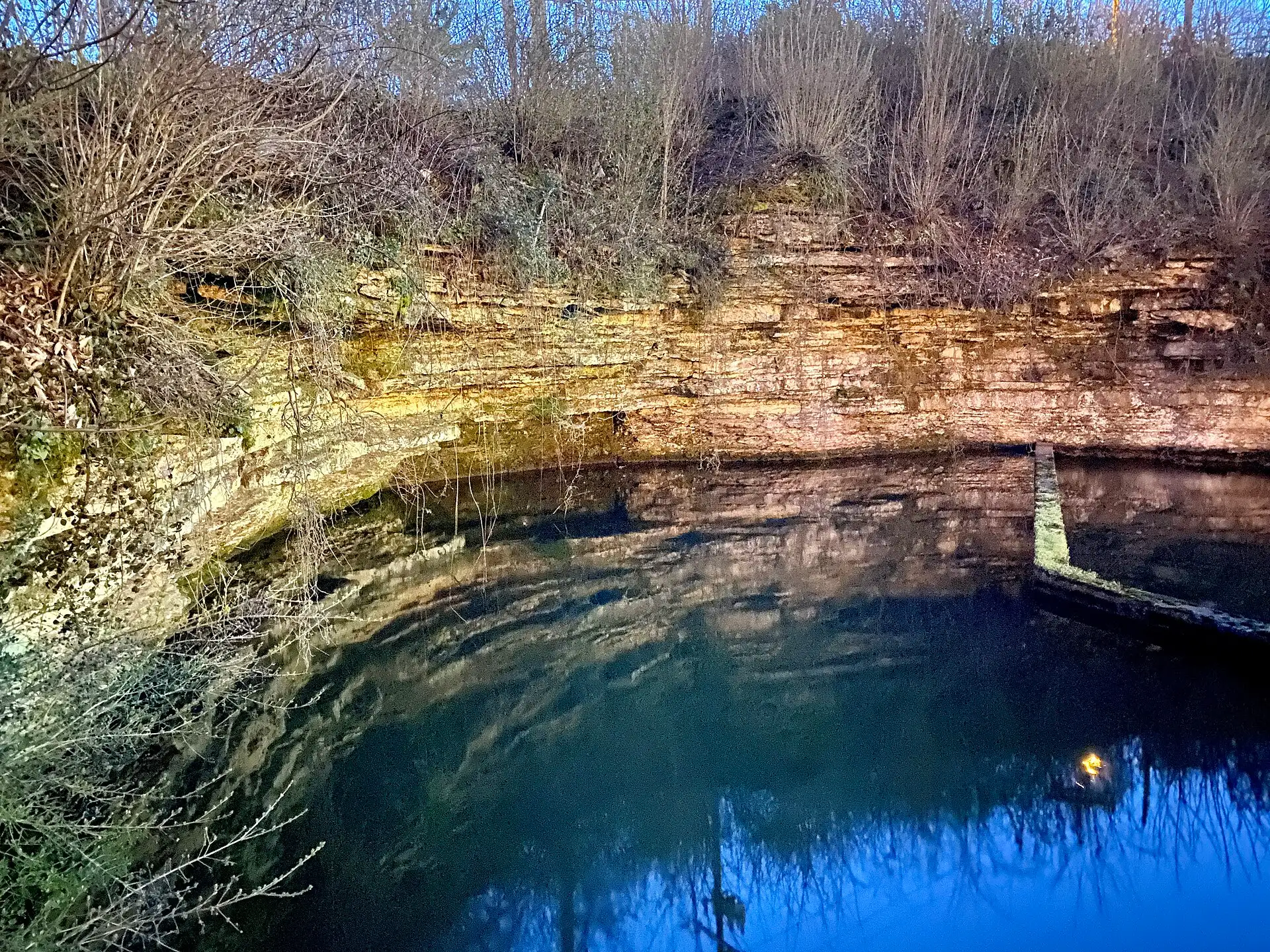 Royal Spring pool below a limestone bank in Georgetown, Kentucky